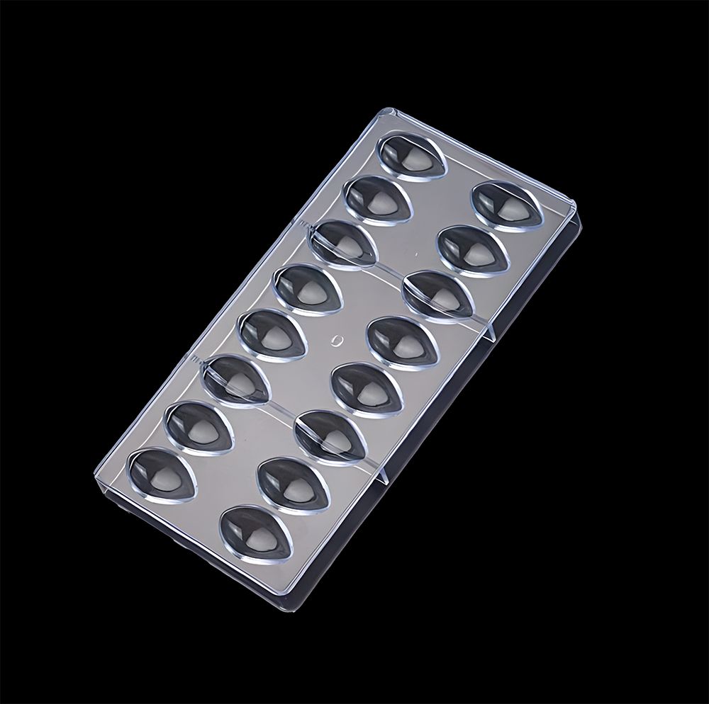 Plastic chocolate mold with 15 teardrop-shaped cavities set against a black background, showcasing a glossy, reflective surface.