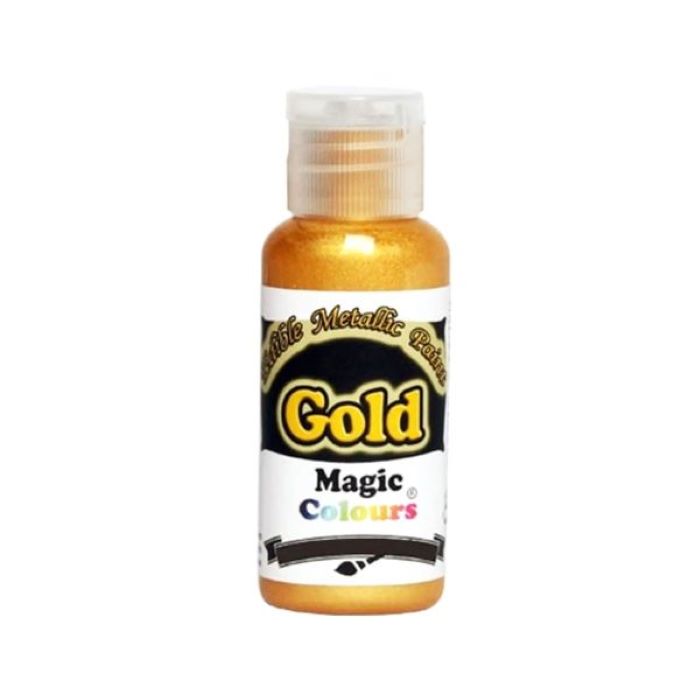 A small bottle of gold metallic paint is displayed. The bottle is labeled &quot;Magic Colours&quot; and indicates that it is an edible metallic paint. The contents appear shimmery and gold in color. The label features the word &quot;Gold&quot; in bold, yellow text on a black background, along with the brand name &quot;Magic Colours&quot; in a colorful font. The bottle has a clear, removable cap at the top.