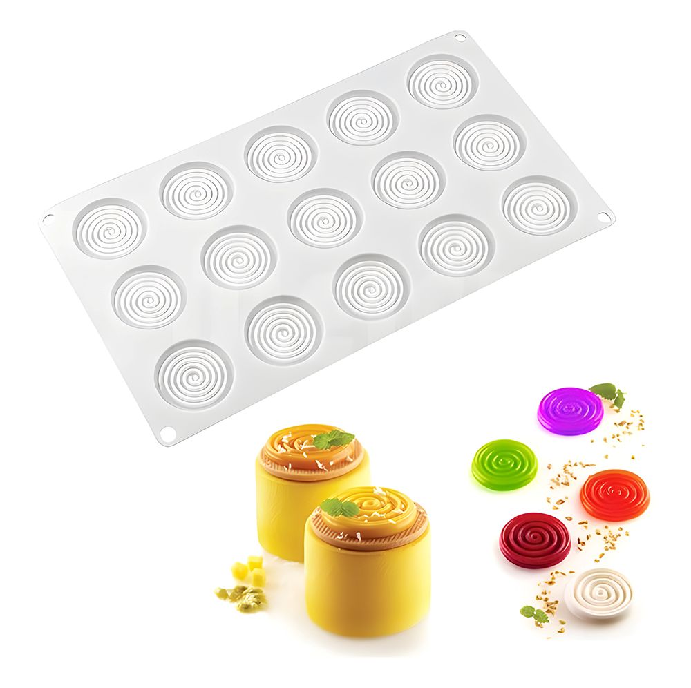 Silicone mold with 15 circular spiral cavities. Finished desserts: yellow mousse cakes, colorful jelly spirals in purple, green, red, and white.