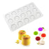 Silicone mold with 15 circular spiral cavities. Finished desserts: yellow mousse cakes, colorful jelly spirals in purple, green, red, and white.