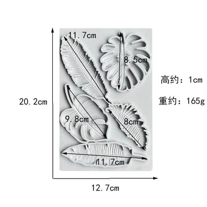 A silicone mold designed for creating palm tropical leaves, featuring various leaf shapes. The mold dimensions are 20.2 cm in height and 12.7 cm in width, with individual leaf measurements indicated. The mold is made of white silicone and has a textured design to replicate the details of tropical leaves.