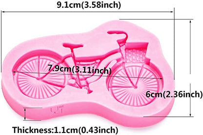 A pink silicone mold shaped like a bicycle, displaying intricate details of the bike&
