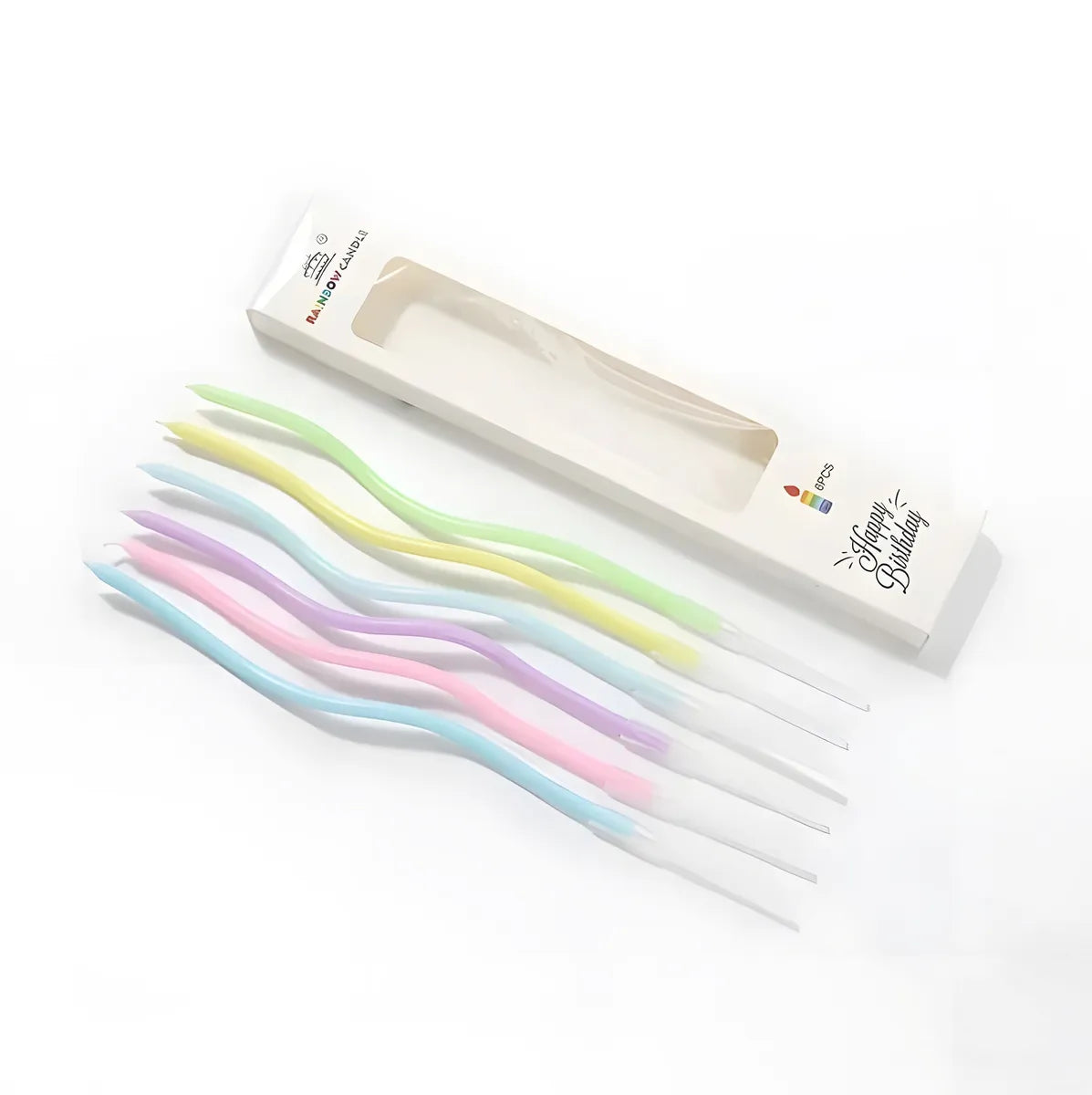 Wavy pastel-colored birthday candles, including blue, pink, yellow, purple, and green, are laid beside an open box labeled "Happy Birthday."