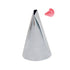 A stainless steel piping nozzle with a pointed tip and a small opening at the top, positioned upright. A small, red blob of frosting or icing is floating near the nozzle, suggesting its use for decorating baked goods. The background is plain white.