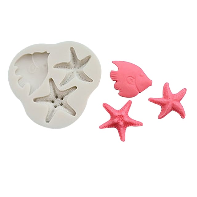 Image shows a white silicone mold designed with three cavities. The mold includes an outline of a fish and two starfish shapes. Next to the mold, there are three completed items: one pink fish and two pink starfish, showcasing the detailed textures and designs. The overall theme is marine-inspired, ideal for crafting or baking.