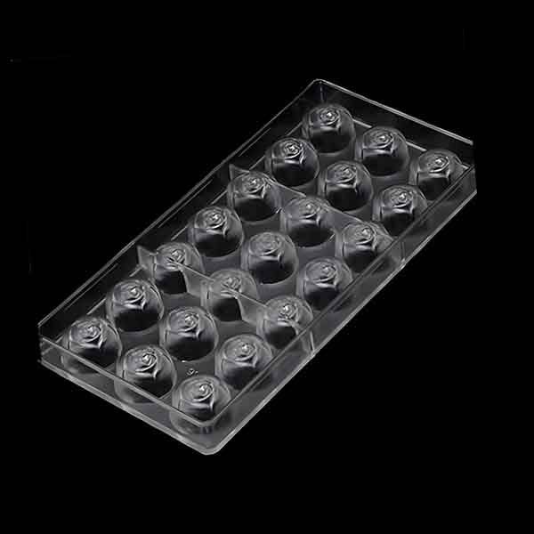 A clear plastic chocolate mold shaped like roses, containing fifteen individual rose cavities arranged in three rows. The mold is presented against a black background.