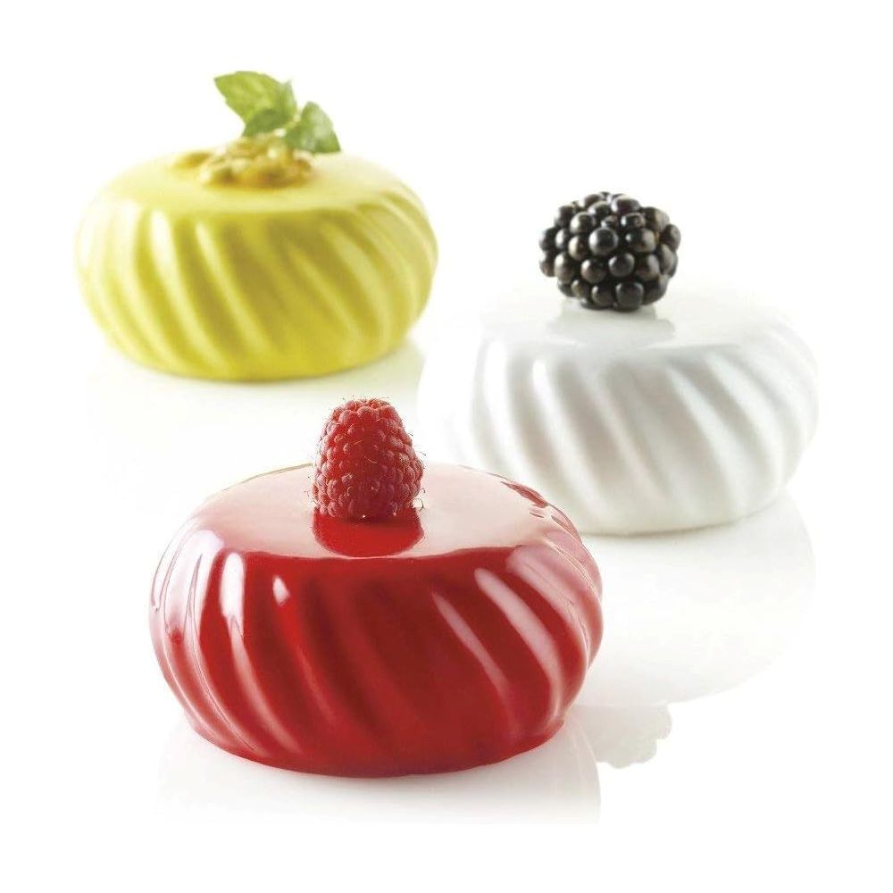  A trio of different desserts arranged on a white background, highlighting their unique shapes and flavors.