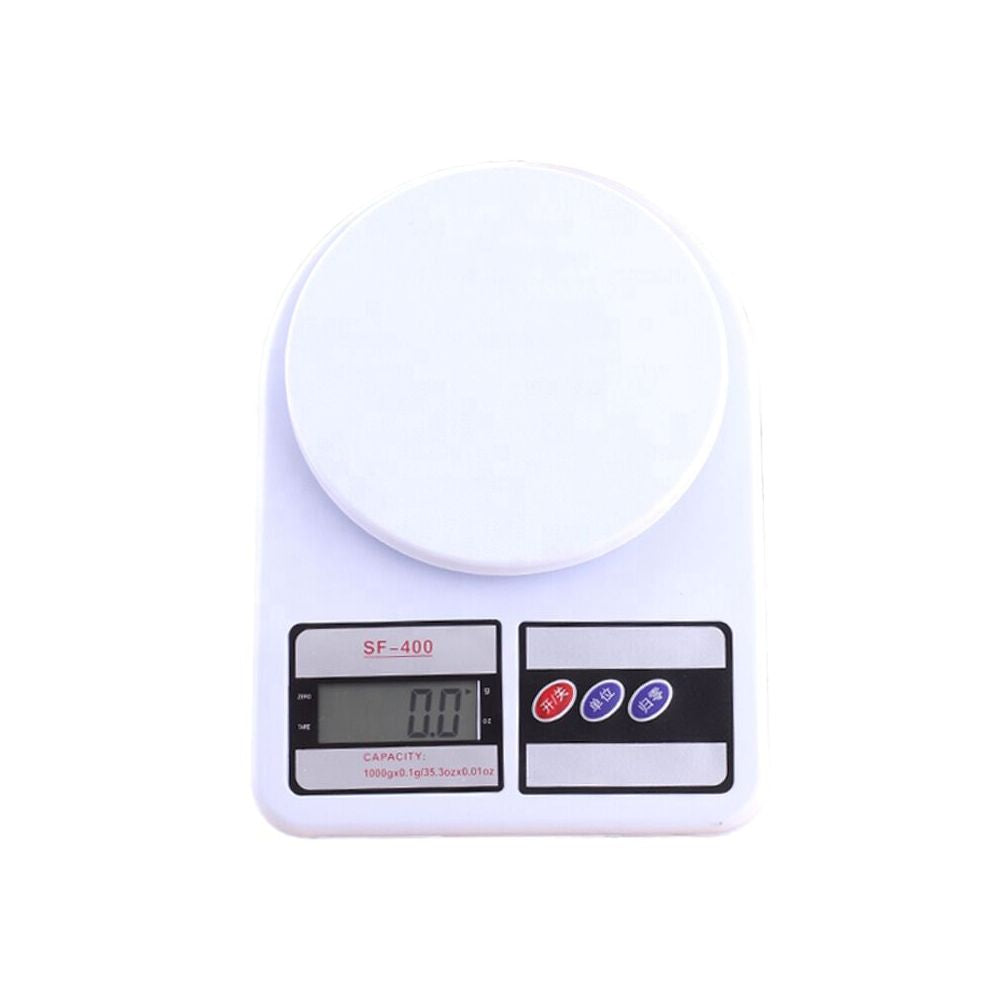 A white electronic scale with a digital readout, used for measuring weight.