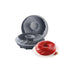 Gray silicone Bundt cake molds with a spiral design are shown beside a vibrant red gelatin dessert on a white plate, garnished with raspberries.