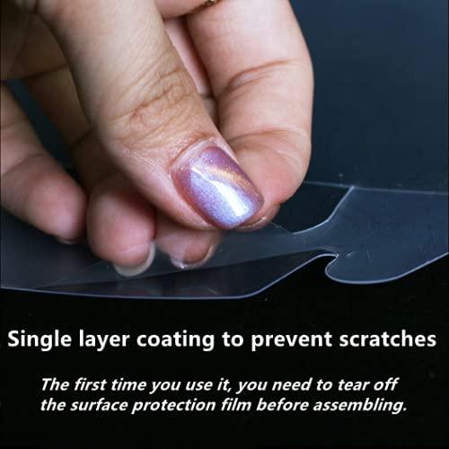 A hand is peeling back a protective film from a transparent PVC cake box. The image includes text that states: "Single layer coating to prevent scratches. The first time you use it, you need to tear off the surface protection film before assembling."