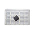 Clear plastic grid tray with 24 square compartments. A black square tile is placed diagonally in the center, creating a contrast with the transparent tray.