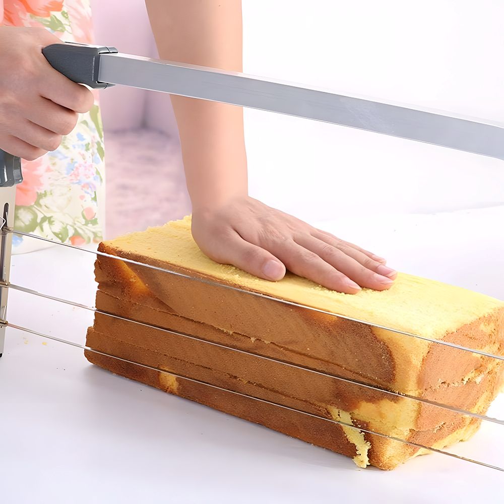 A person carefully cutting a piece of bread with a knife, showcasing the texture of the loaf.