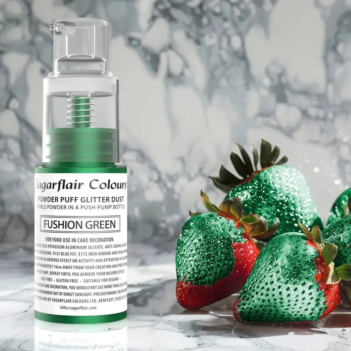 A bottle of green hair dye alongside strawberries, highlighting a contrast between the dye and the fruit.