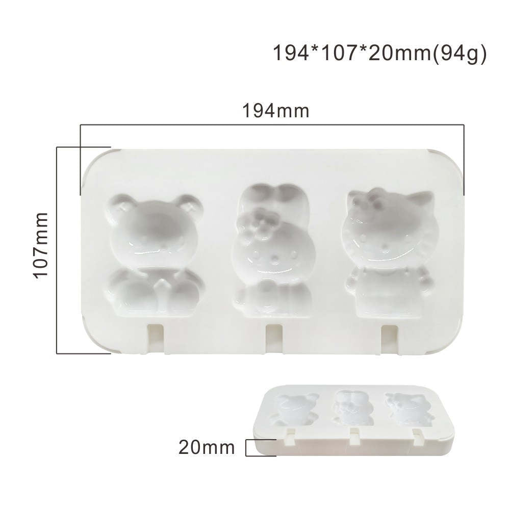 A white silicone mould designed for making teddy bear and character-shaped cakesickles. The mould features three cavities: a teddy bear on the left, a character with a bow in the center, and a cat-like character on the right. Dimensions of the mould are indicated as 194mm x 107mm x 20mm.