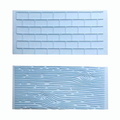 The image displays a two-piece set of silicone impression moulds designed for crafting. The top mould features a textured pattern resembling a brick wall, characterized by rectangular shapes arranged in a grid. The bottom mould showcases a design that mimics the texture of tree bark, with wavy lines and swirls that represent the natural grain and patterns found in wood. Both moulds are light blue in color, highlighting their detailed impressions.