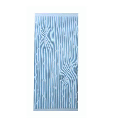 "A blue silicone mold designed to create impressions of tree bark textures. The mold features detailed patterns resembling wood grain, swirls, and lines, suitable for use in various crafting or decorative projects."