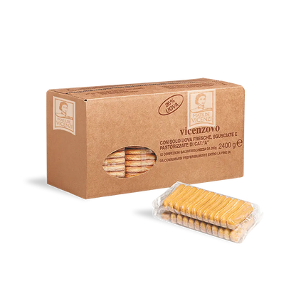 A large brown box of Vicenzovo ladyfingers is displayed on a black background. The box has a clear window showing packed biscuits and an additional clear plastic package of ladyfingers is placed beside it.