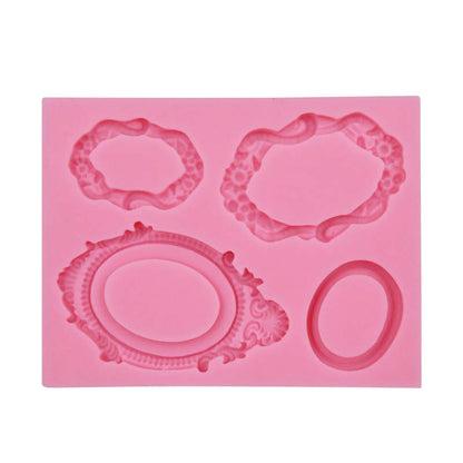 A pink silicone mold featuring various vintage mirror frame shapes. The mold includes four different designs: two ornate oval frames, one circular frame, and one floral decorative frame, all designed for creating detailed resin or craft pieces.