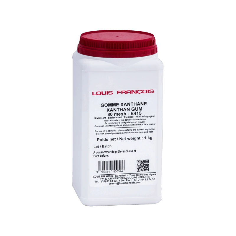 A small container of white powder isolated on a black backdrop.