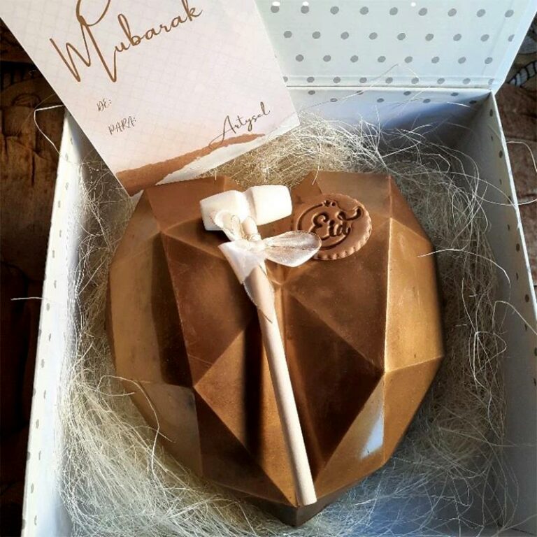 Eid Mubarak chocolate heart gift with card and small wooden hammer in a decorative box, ideal for Eid celebrations, available at Cake Craft UAE.